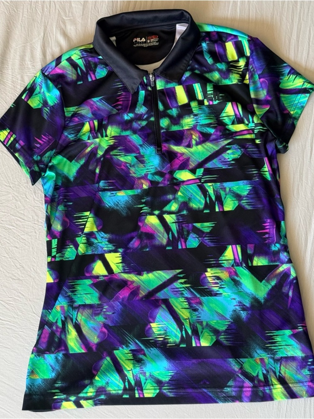 FILA Women's Black Polo with Neon Green Blue Purple Abstract Print